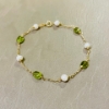 Bracciale in oro perle e peridoto 