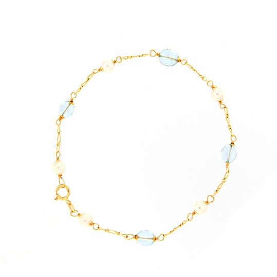 Bracciale in oro perle e topazio azzurro